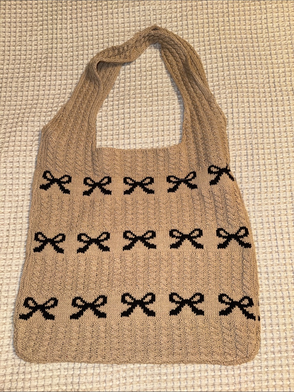 Beige Knit Tote Bag with Black Bow Pattern